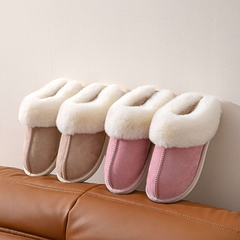 Gros plan sur les chaussons d'hiver douillets pour femmes, mettant en valeur leur texture chaude et leur design.