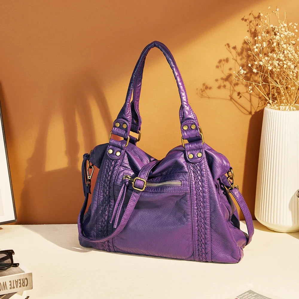 Sac de cours femme vintage spacieux, style hobo synthétique avec bandoulière réglable et pratique.