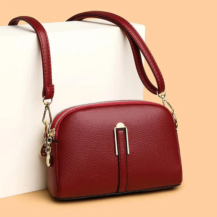 Sac à main femme élégant, en cuir vegan avec bandoulière. Le sac quotidien chic et fonctionnel pour la femme moderne.