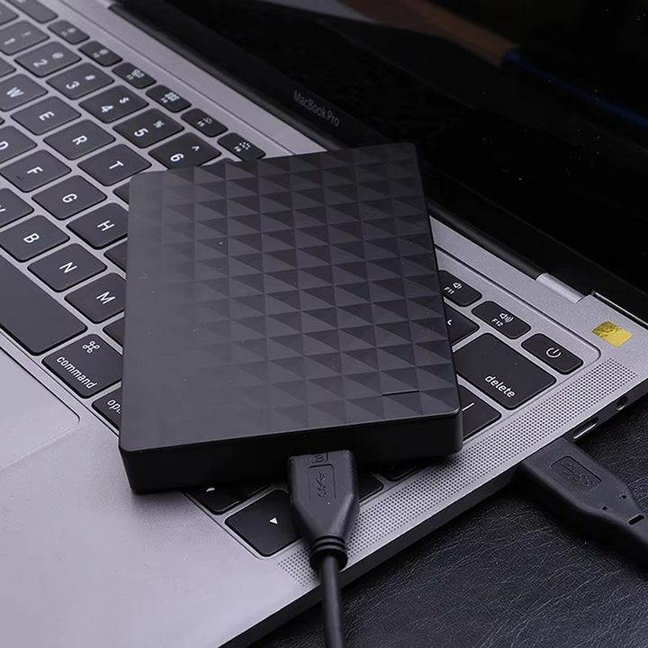 Disque dur externe USB 3.0 compact de 2 To. Appareil de stockage portable pour sauvegarder vos fichiers rapidement.