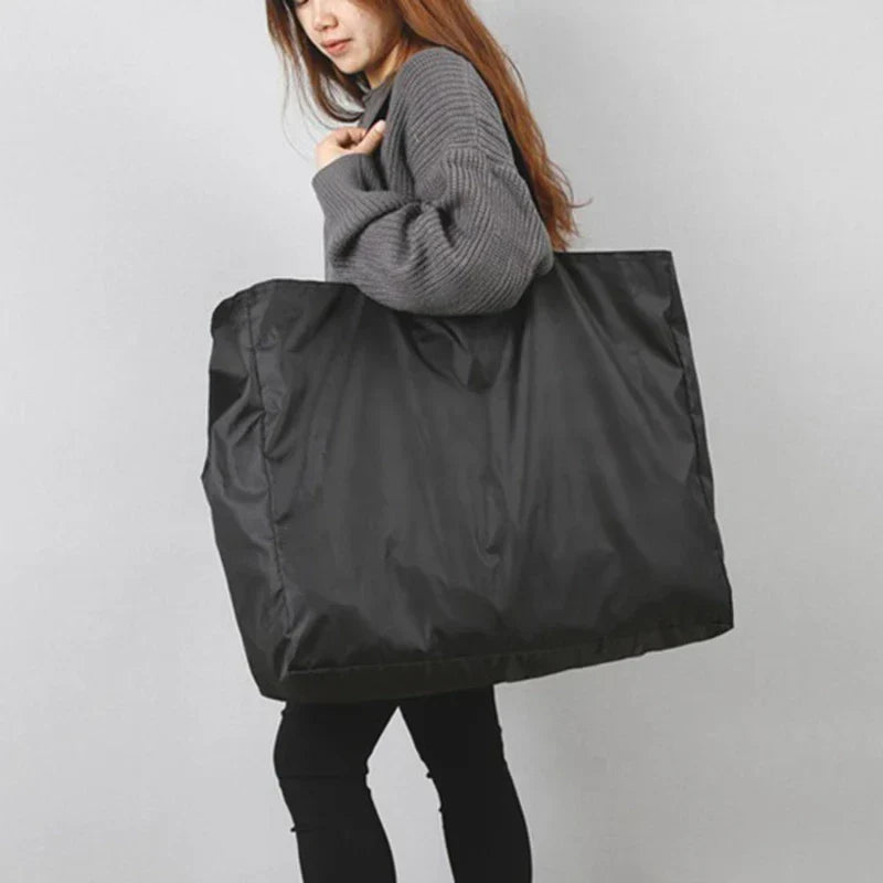 Grand sac de voyage imperméable pour femmes, pliable et léger, idéal pour les voyages, le sport ou un week-end prolongé.