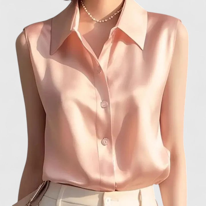 Blouse femme élégante et sophistiquée sans manches, idéale pour le bureau ou une soirée chic en été.