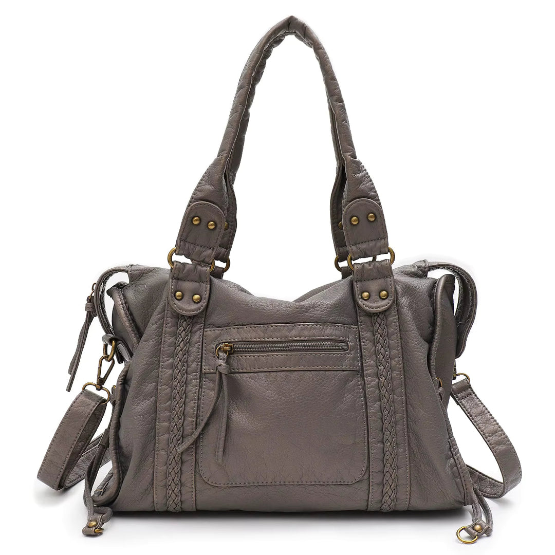 Texture similicuir luxe pour sac de cours femme, finition élégante, mode vintage, qualité supérieure.