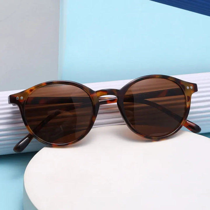 Protection UV400: lunettes de soleil rondes polarisées unisexes pour clarté optique et confort.