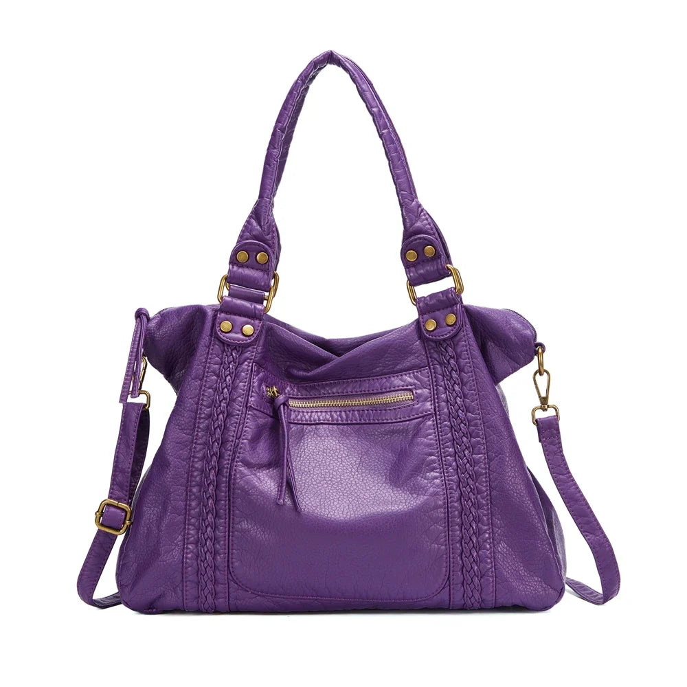 Sac femme vintage style hobo, grand et spacieux pour les cours, avec bandoulière ajustable.