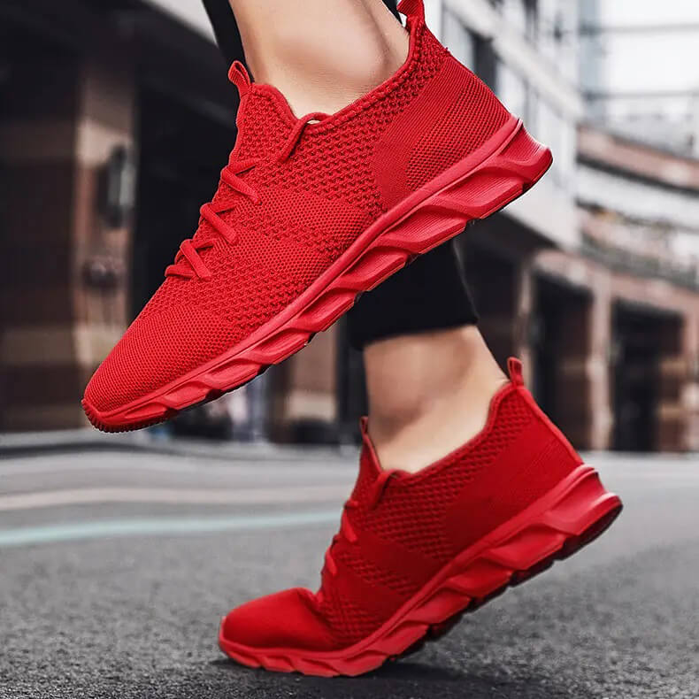 Chaussures athlétiques PureMotion, idéales pour hommes actifs, alliant confort, légèreté et style.