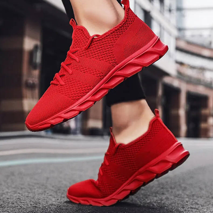 Chaussures athlétiques PureMotion, idéales pour hommes actifs, alliant confort, légèreté et style.