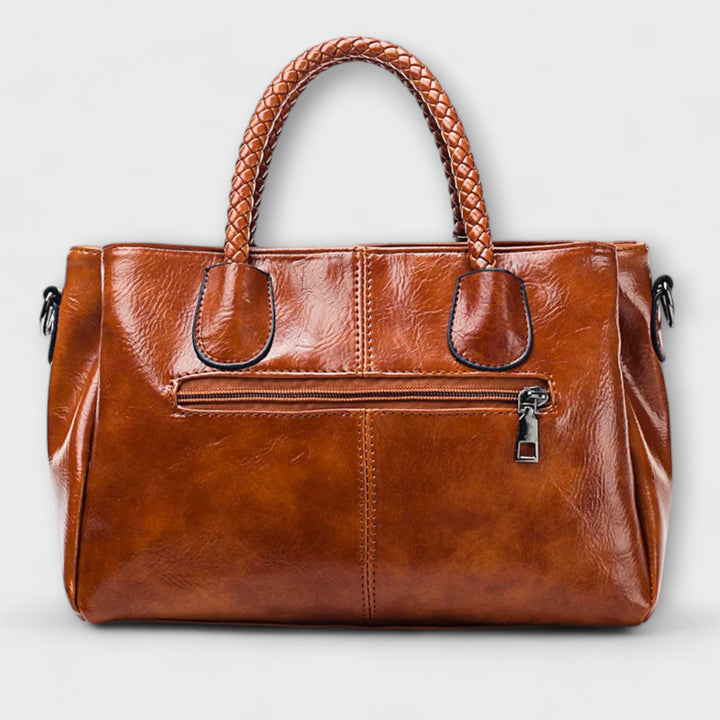 Grand sac polochon fourre-tout, spacieux et confortable pour le voyage ou le sport. Accessoire polyvalent.