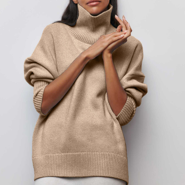 Élégant pull femme noir hiver, coupe ample et matière douce. Chandail confortable et polyvalent pour femme.
