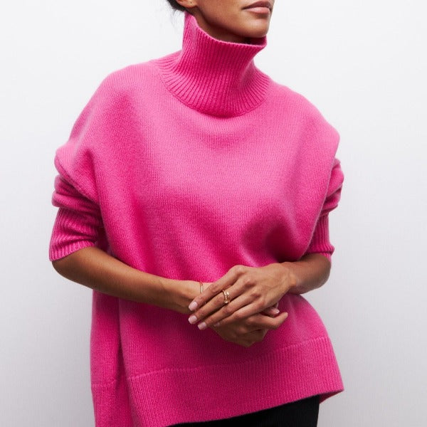 Pull femme gris hiver chic et confortable. Chandail doux à coupe ample, parfait pour une mode féminine tendance.