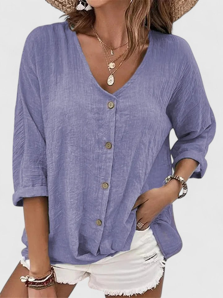 Chemisier chic femme polyvalent, boutonnée, offre confort et mode pour le printemps et l'été. Style décontracté.