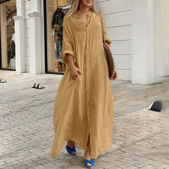 Robe oversize chic femme, style chemise longue fluide, un vêtement élégant et décontracté.