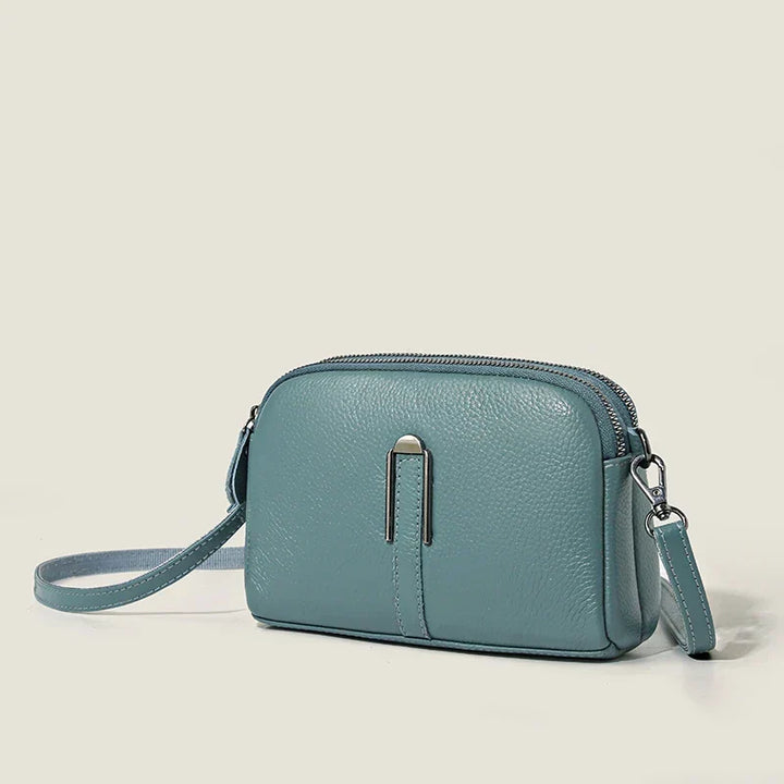 Sac bandoulière luxe femme, élégant cuir PU, organisation impeccable. Accessoire mode chic pour un style raffiné.