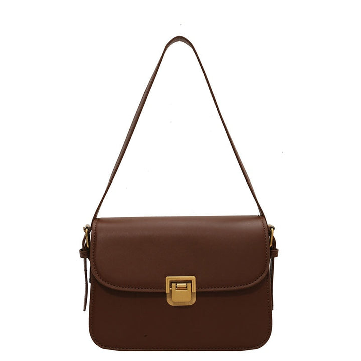 Sac bandoulière carré élégant en cuir vegan pour femme, idéal pour le quotidien.