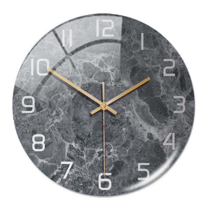 Décorez avec cette horloge murale silencieuse Ø30 cm, effet marbre, style épuré et moderne.