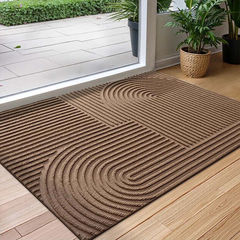 Paillasson résistant en polyester durable, absorbant et antidérapant. Parfait pour intérieur ou extérieur, facile d'entretien.