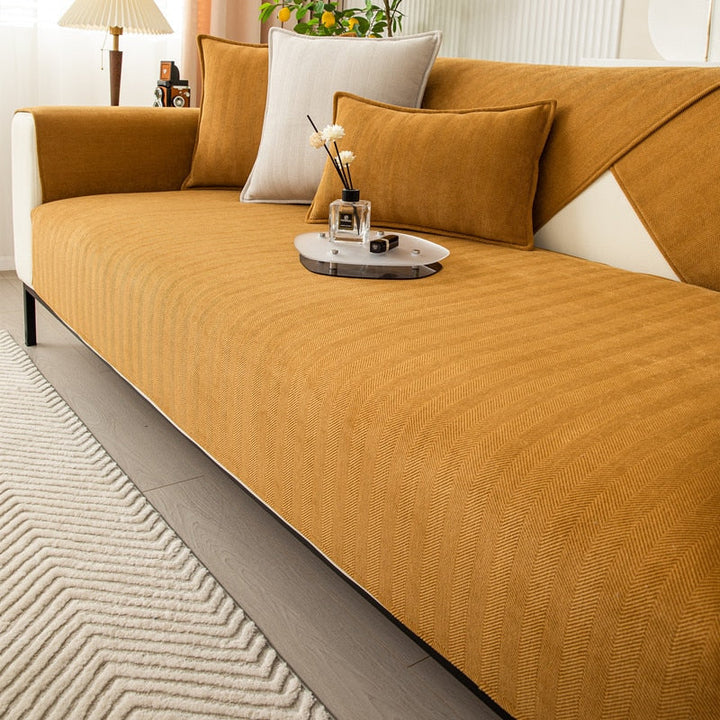 Housse de canapé extensible et élégante, parfaite pour la protection et la décoration moderne de votre salon.