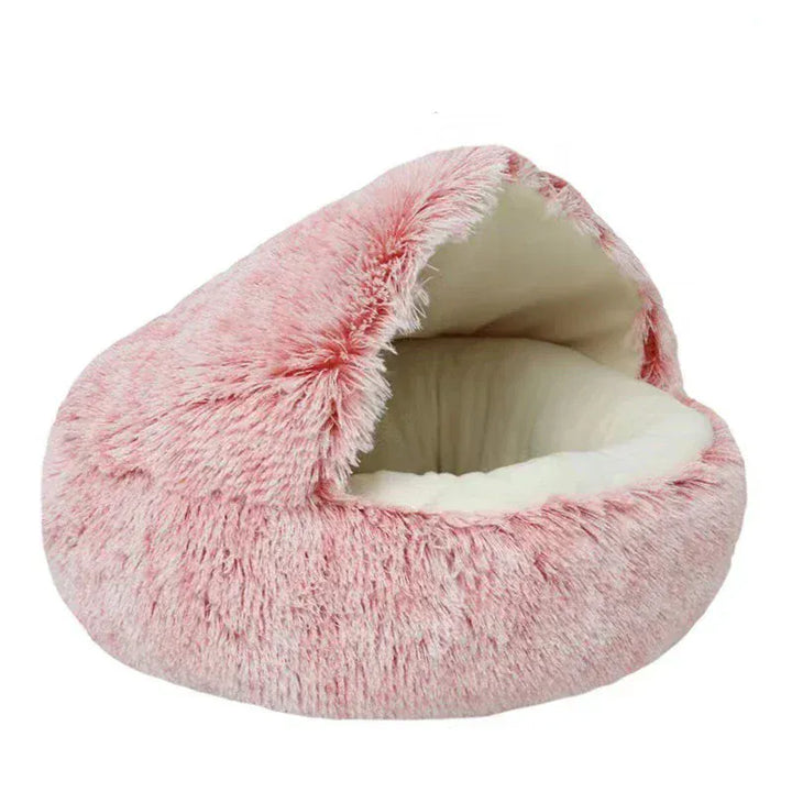 Nid douillet pour animaux frileux : ce lit chauffant en peluche procure une chaleur apaisante aux chats et chiens.