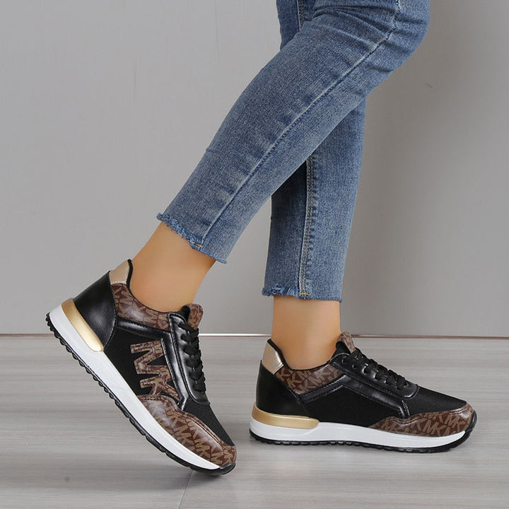 Chaussures de sport femme décontractées, avec semelle antidérapante et design moderne.