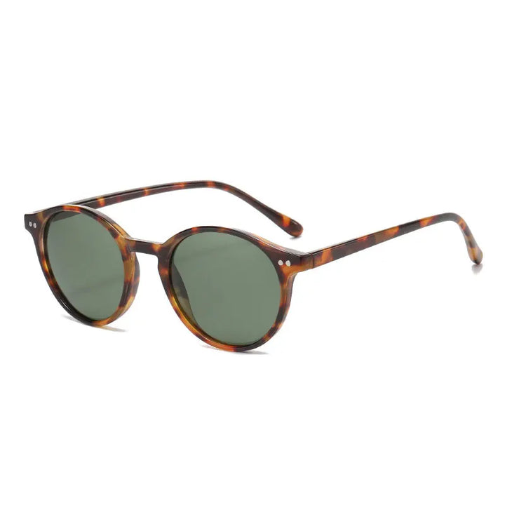 Monture ronde rétro pour ces lunettes de soleil polarisées unisexes UV400, protection solaire efficace.