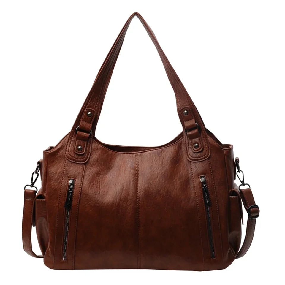 Vue latérale du sac cabas Magda, révélant son volume spacieux et pratique pour femme organisée.