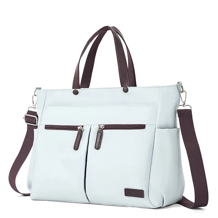 Sac universitaire grande capacité pour étudiantes, léger, avec organiseur intégré, très pratique.