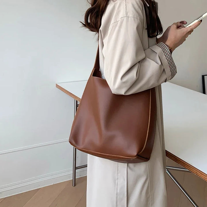 Sac à main cabas en similicuir pour femme, accessoire intemporel et élégant, toutes occasions.