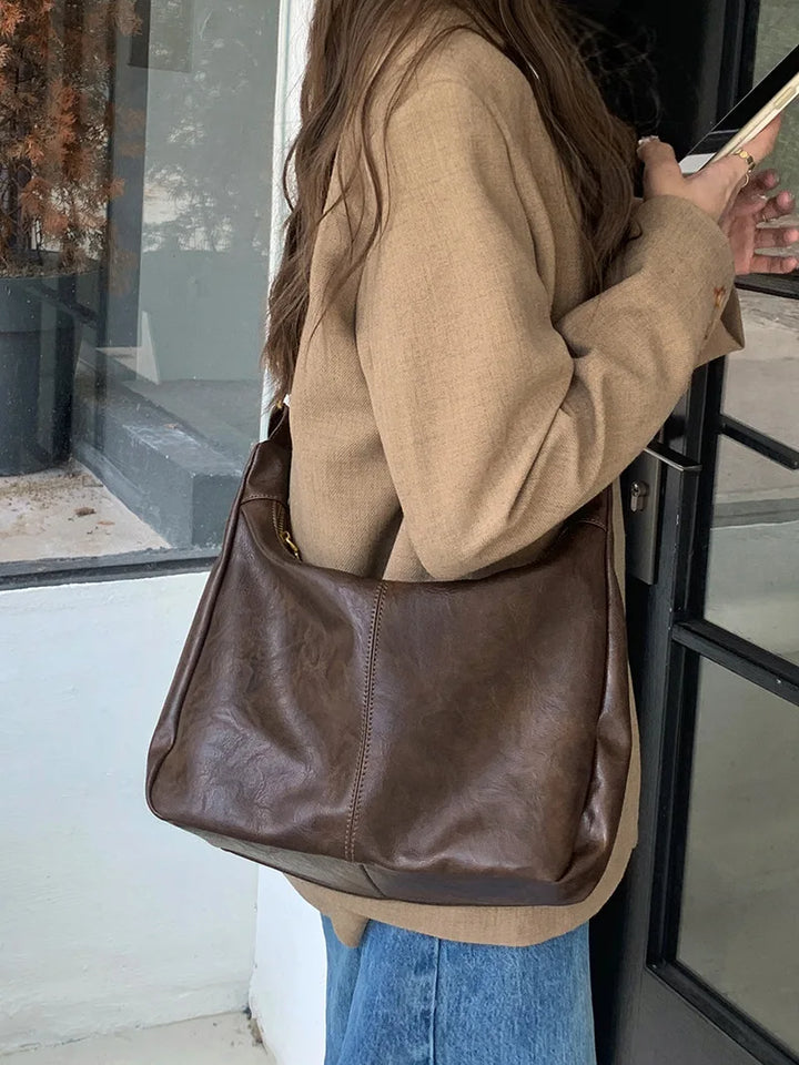 Sac à main bandoulière femme similicuir. Compartiments pratiques, idéal pour le quotidien. Sac mode, tendance.