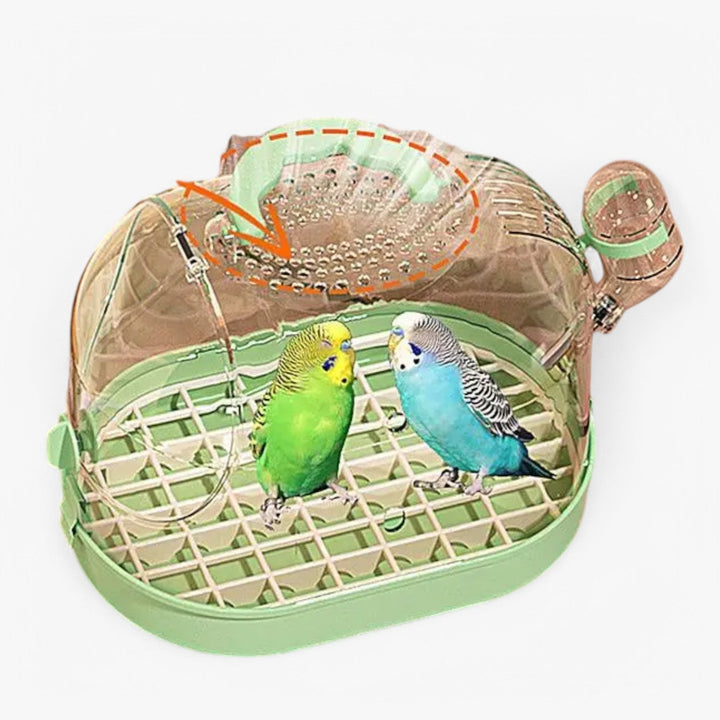 Accessoire de voyage indispensable: cage respirante pour petit animal. Sécurise le transport de votre oiseau ou hamster.