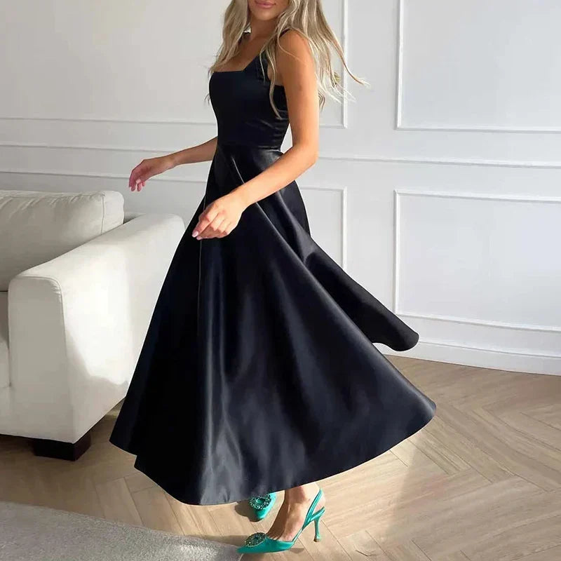 Robe longue femme style intemporel, coupe évasée. Parfaite pour bal, cocktail, ou événements formels. Confort et chic.