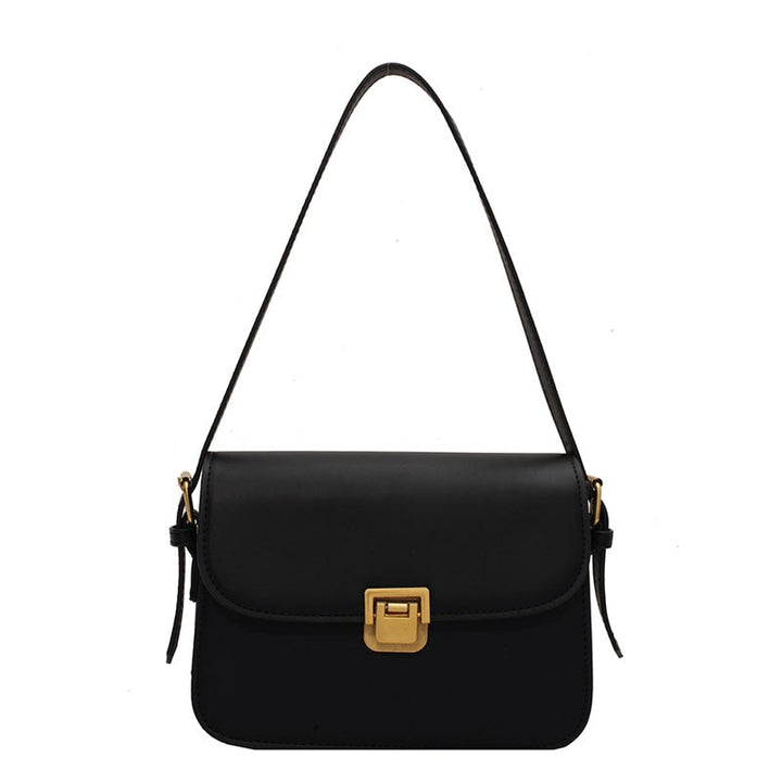 Élégant sac carré en bandoulière en cuir vegan pour femme, au style vintage raffiné.