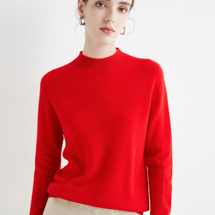 Élégant pull femme col rond PARIS en cachemire, confortable et chaud, parfait pour les saisons fraîches.