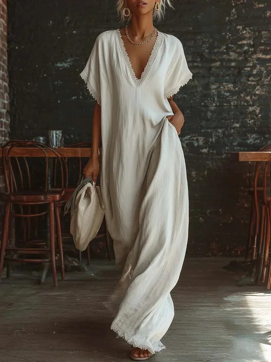 Robe d'été femme, longue et fluide, col V avec dentelle raffinée. Ample et fashion pour un look élégant.