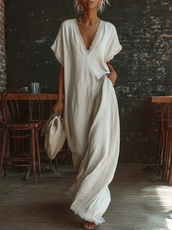 Robe d'été femme, longue et fluide, col V avec dentelle raffinée. Ample et fashion pour un look élégant.