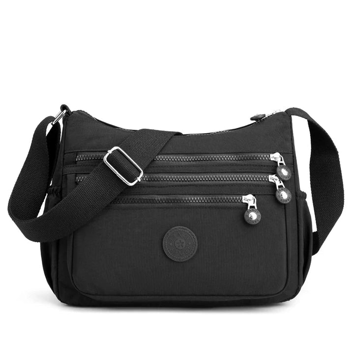 Sac bandoulière multifonction pour femme, offrant une excellente organisation quotidienne.
