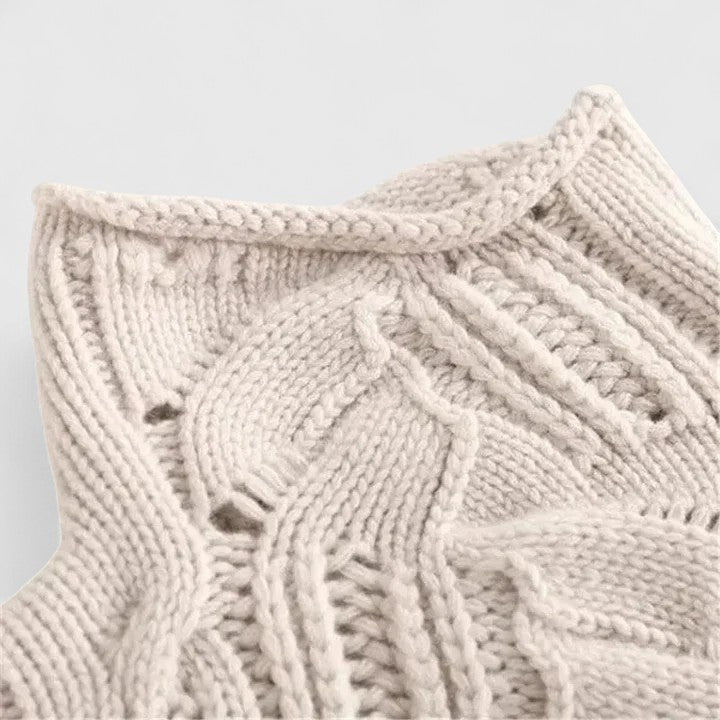 Pull femme en tricot élégant et confortable, coupe décontractée chic pour l'hiver.