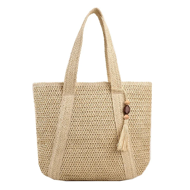Sac de plage en paille bohème pour femme, modèle Tavira. Un indispensable chic pour l'été.