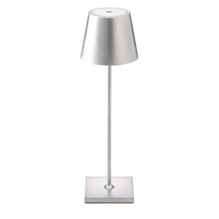 Lampe d'appoint portable avec batterie rechargeable, design chic et éclairage LED pour ambiance cosy.