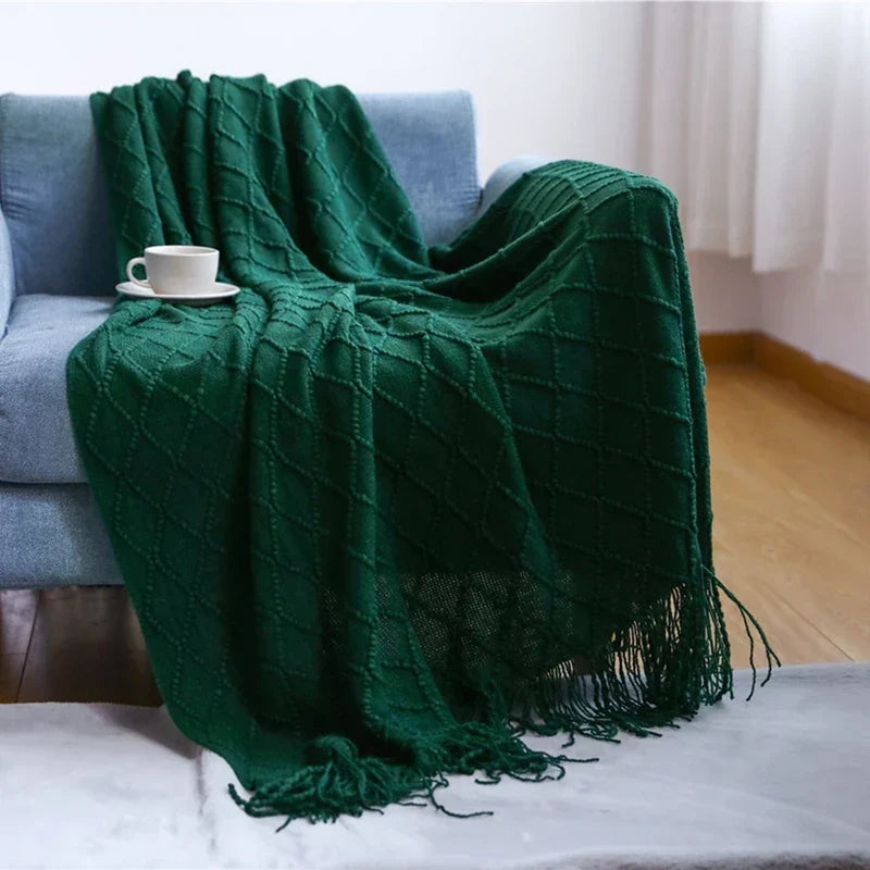 Couverture tricotée pour une déco salon bohème, alliant confort, douceur et un design intemporel.