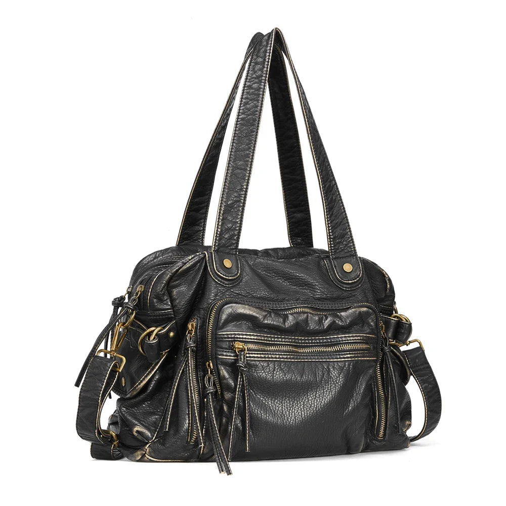 Sac femme organisateur chic pour cours, style vintage noir, bandoulière réglable.