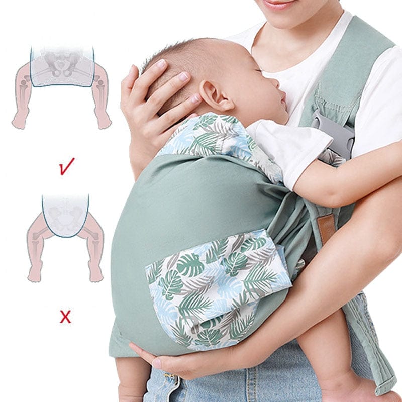 Maman portant bébé confortablement dans une écharpe de portage mains-libres, renforçant le lien parent-enfant.
