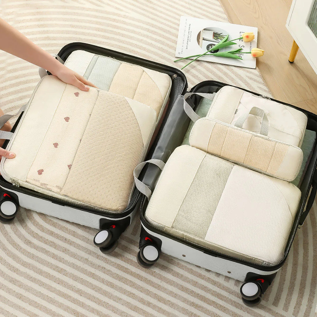Kit 5 pièces d'organisateurs de compression étanches en polyester pour un rangement modulable de vos bagages de voyage.