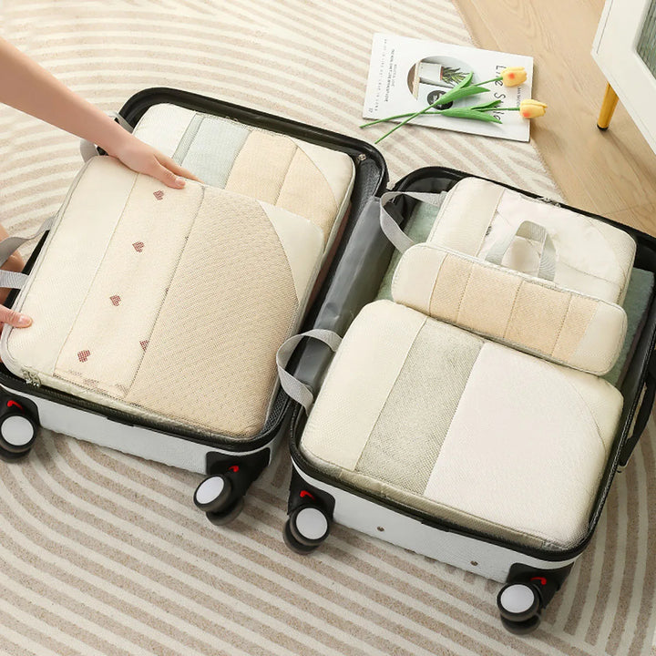 Kit 5 pièces d'organisateurs de compression étanches en polyester pour un rangement modulable de vos bagages de voyage.