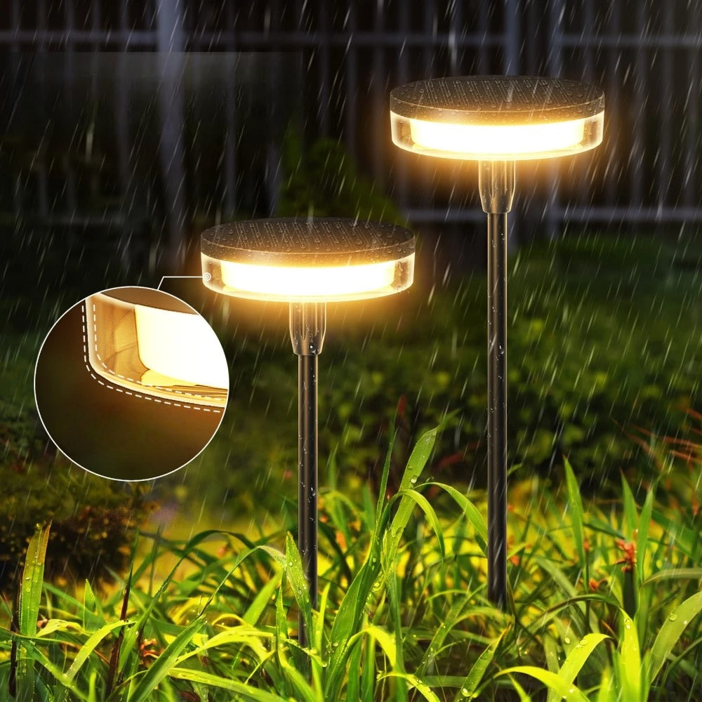Lampe solaire décorative pour jardin, lumière LED oscillante reproduisant des lucioles.