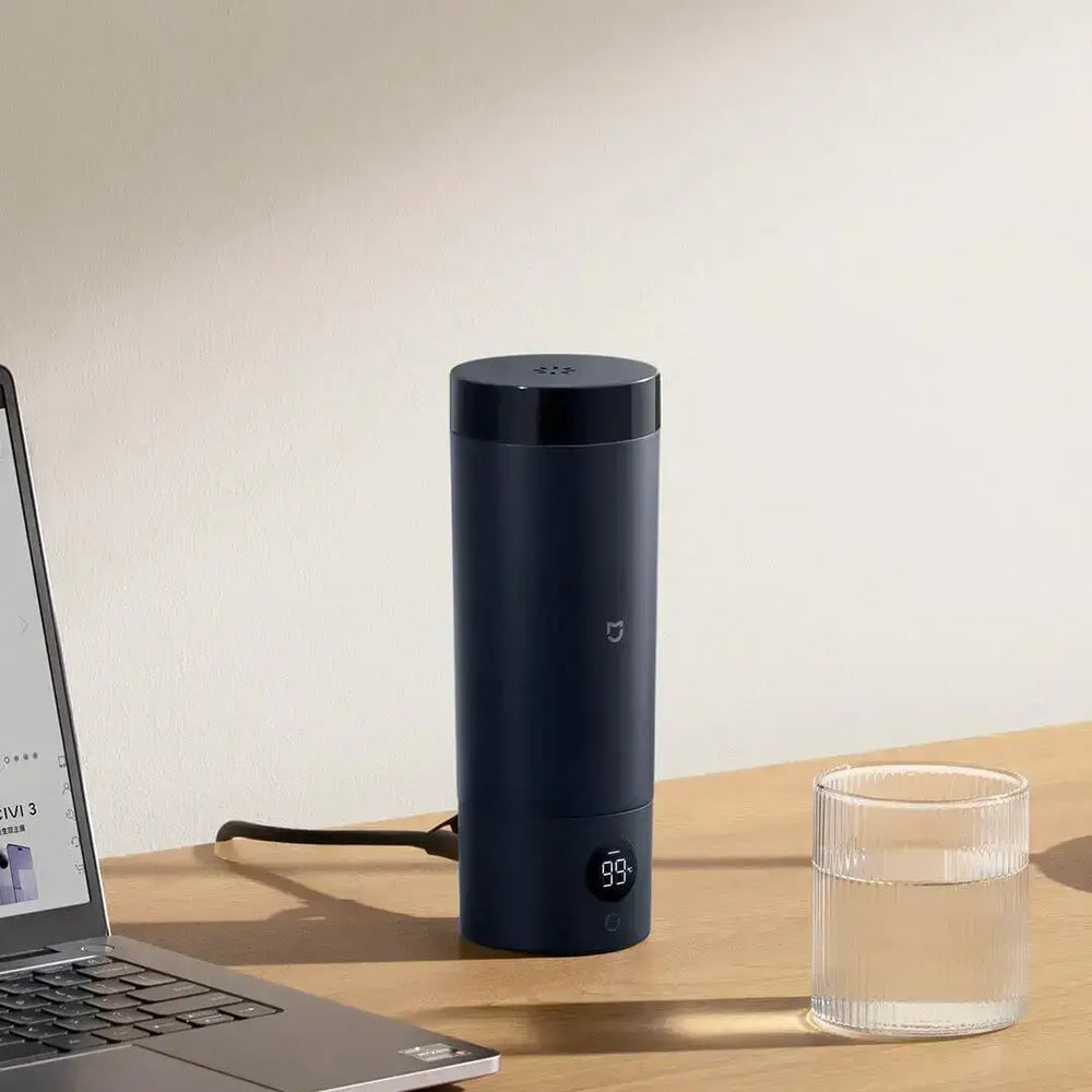 Bouilloire électrique compacte en acier inoxydable, 6 réglages de température, idéale pour maison et voyage.