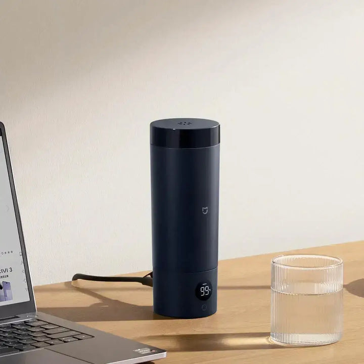 Bouilloire électrique compacte en acier inoxydable, 6 réglages de température, idéale pour maison et voyage.