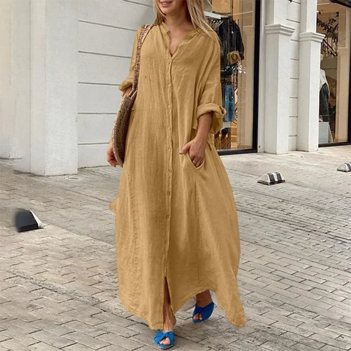 Robe longue femme oversize, style chemise fluide chic, parfaite pour un confort moderne.