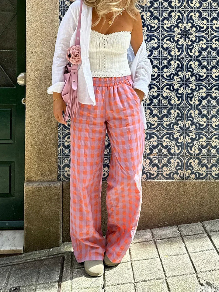Mode femme: pantalon à carreaux confortable, coupe droite et taille haute, parfait pour look estival.