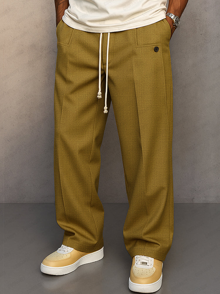 Pantalon homme décontracté noir à cordon et taille élastique, coupe ample moderne pour le confort quotidien.