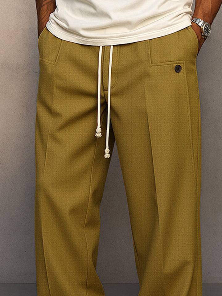 Pantalon streetwear homme ample, confortable, à cordon et taille élastique, tendance pour la mode urbaine.